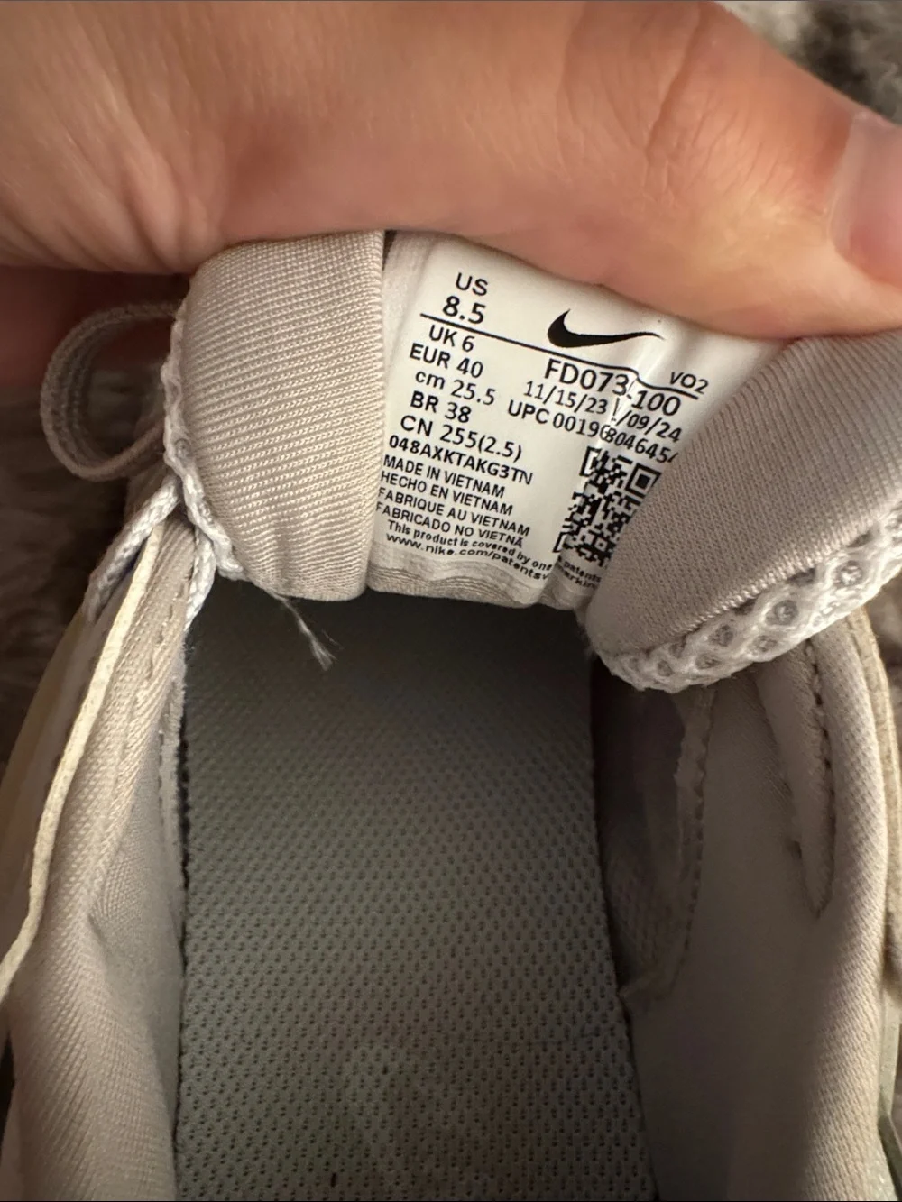 Nike Light Gray and Cream Mesh Running Sneakers with Black Swoosh